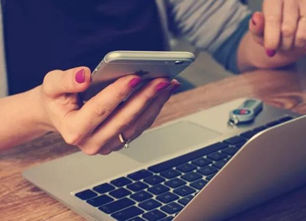 woman's hand using cellphone